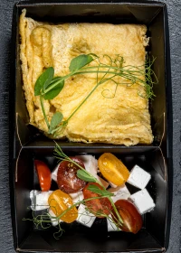 Egg pancake with tomatoes and feta