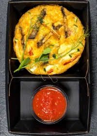 Frittata with vegetables and tomato sauce