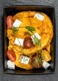 Omelet with feta and tomatoes