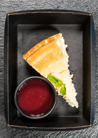 cheesecake with berry sauce