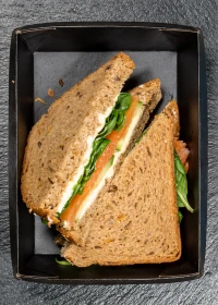 salmon, omelette, and spinach sandwich